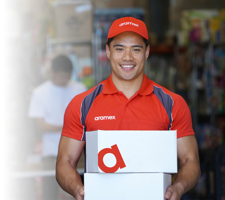 Aramex courier holding parcels